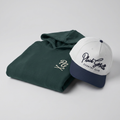 Plaid Gorilla Golf Bogey Kit — pine hoodie with PG logo, paired with navy/white Country Club snapback