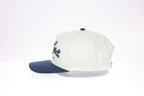 White and navy cap with text on a white background